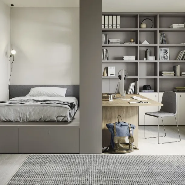 Cameretta con letto su cassettone e ampia libreria Next space 02 di Nidi