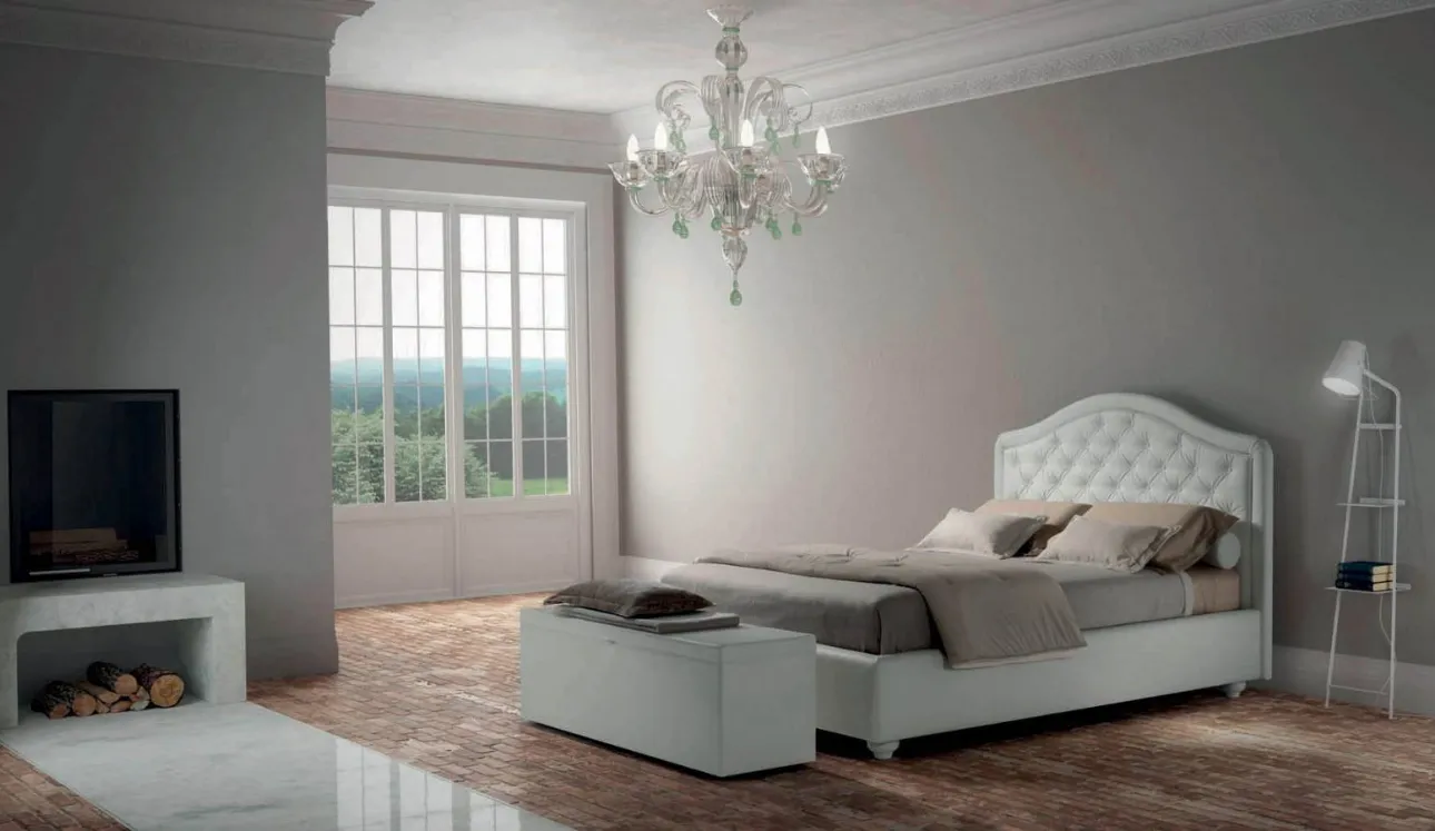 Letto in ecopelle con testiera sagomata e trapuntata Infinity di Bside