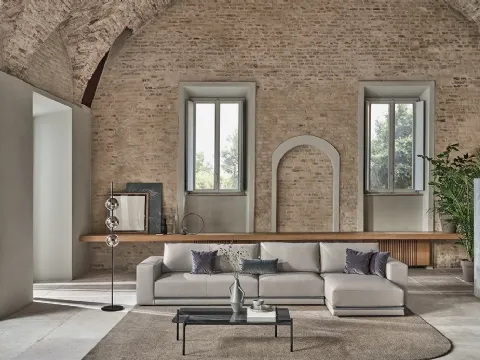 Divano in ecopelle con penisola Pitagora di Bontempi